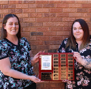 Sarah-Lynn Parker and Amber Cox presented with Ess